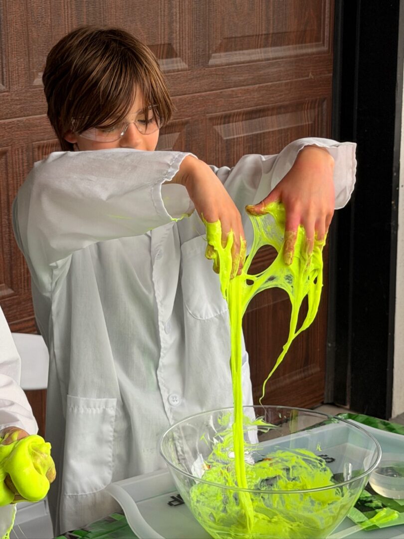 Kid experimenting with gooey slime