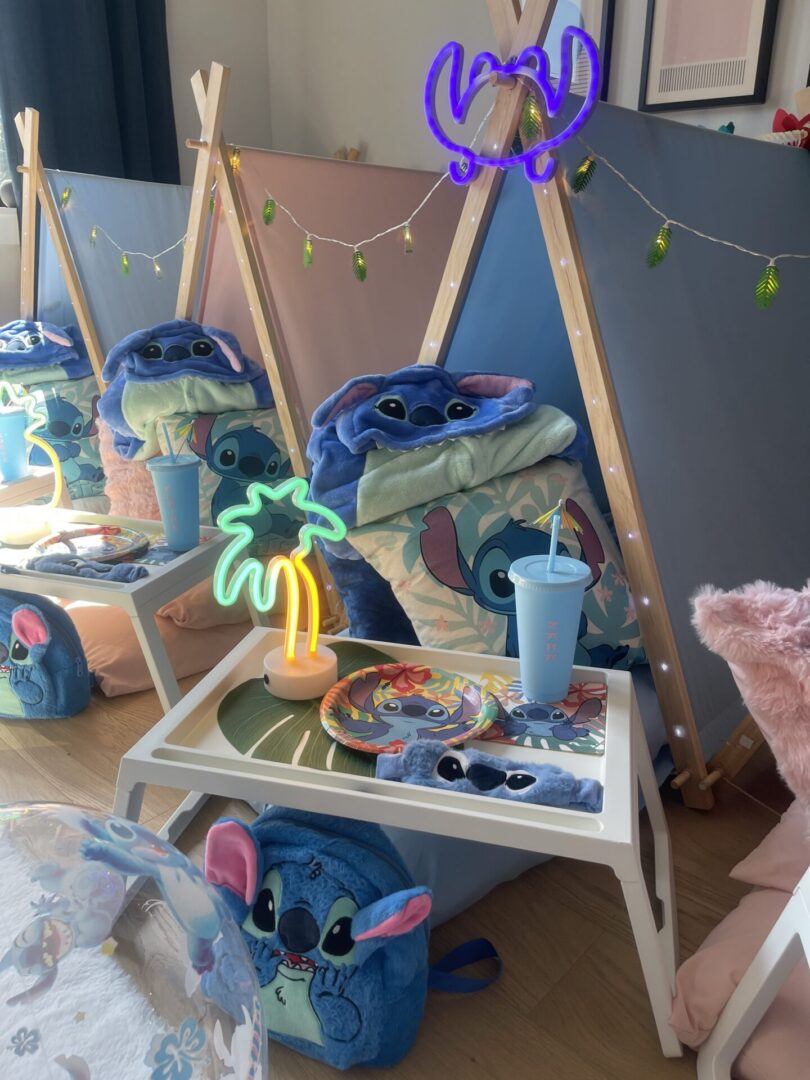 Kids' sleepover setup with themed decorations.