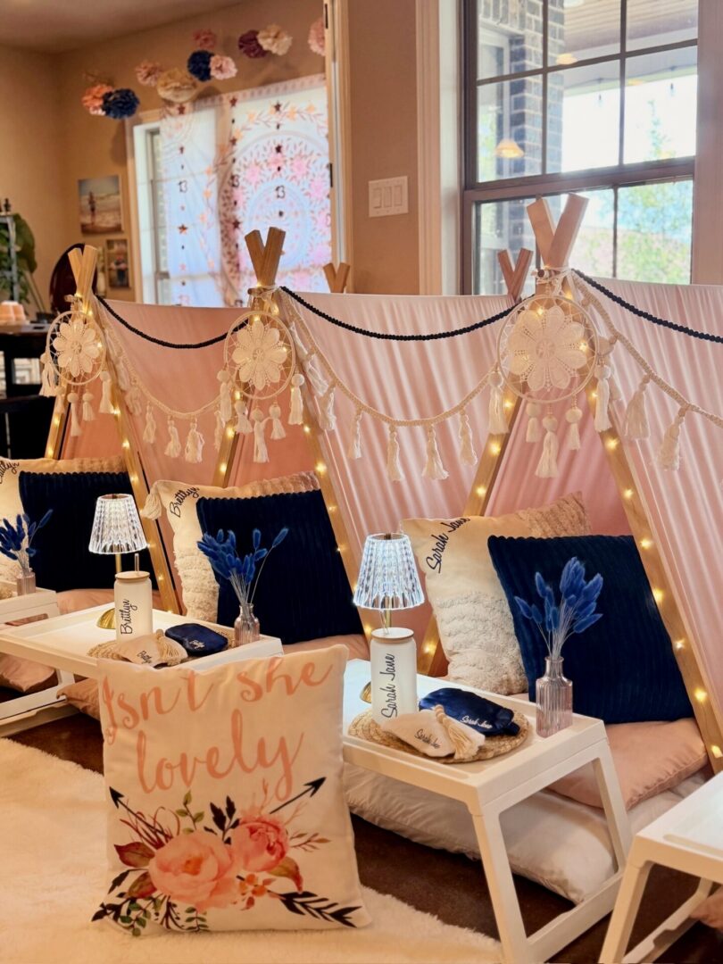 Cozy indoor teepee setup with decorations.