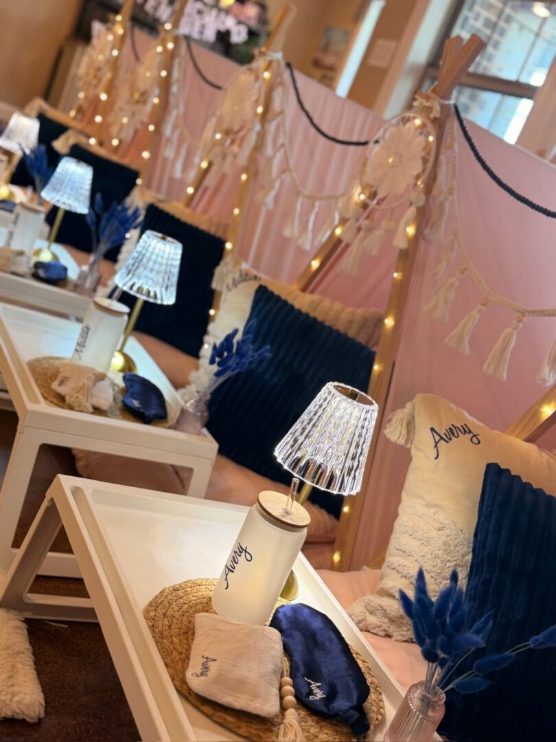 Cozy indoor setup with lamps and pillows.