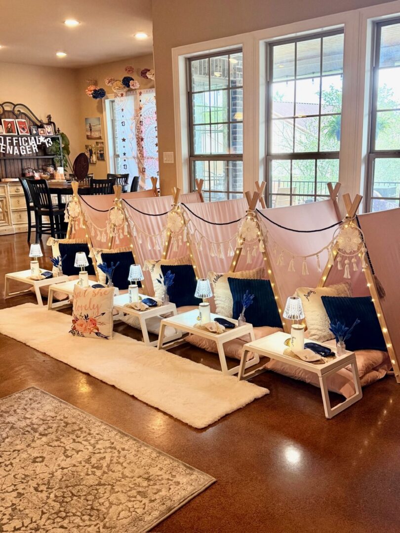 Indoor teepee tents setup for a party.