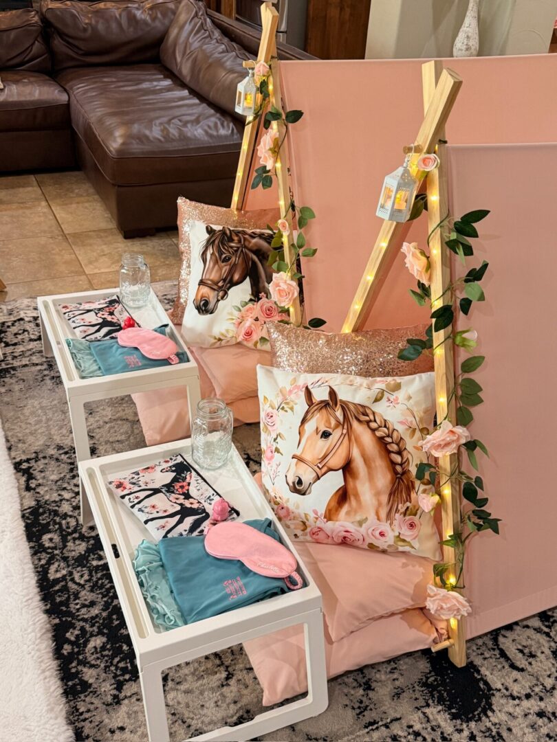 Horse-themed sleepover setup with pillows and trays.